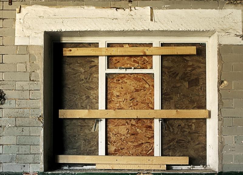 Boarded,Up,Old,Window,In,A,Derelict,Building Image description