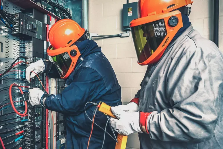 Electrical contractors testing commercial electrical panels in Los Angeles